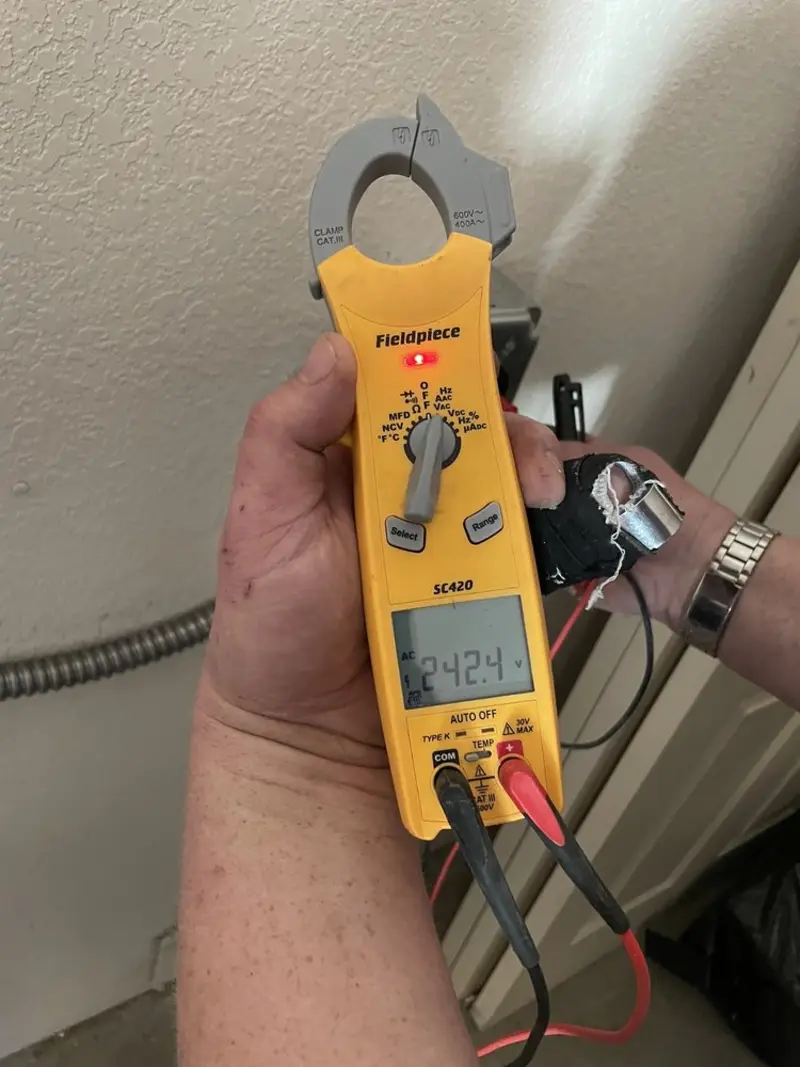 Voltage testing with clamp meter during Generator Installation in North Haven
